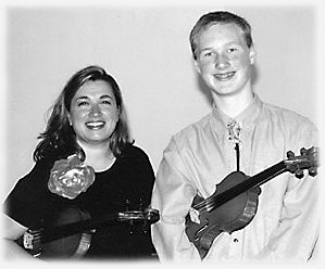 John Schindele, Moore Academy 10th grader, with his violin teacher Mrs. Fontana